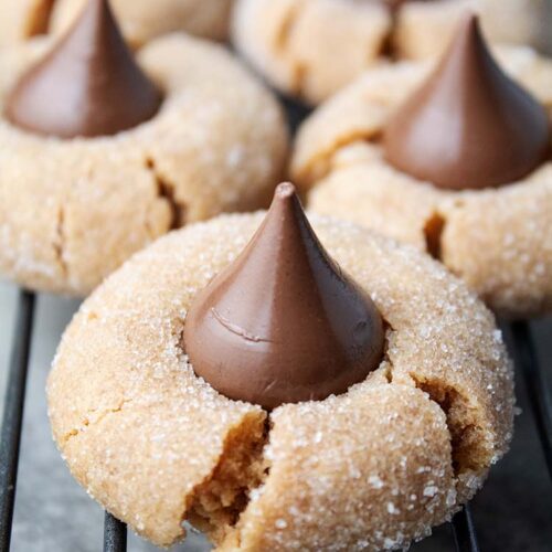 peanut butter blossoms on a wire cooling rack
