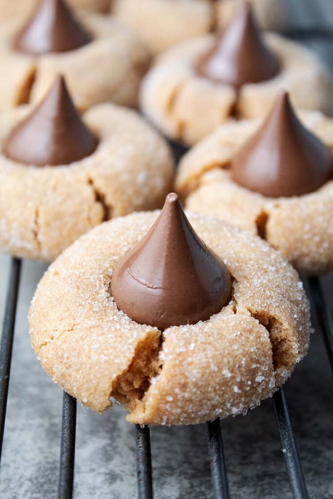 peanut butter blossoms on a wire cooling rack