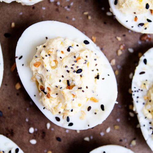 overhead closeup view of deviled eggs with everything bagel seasoning sprinkled on top
