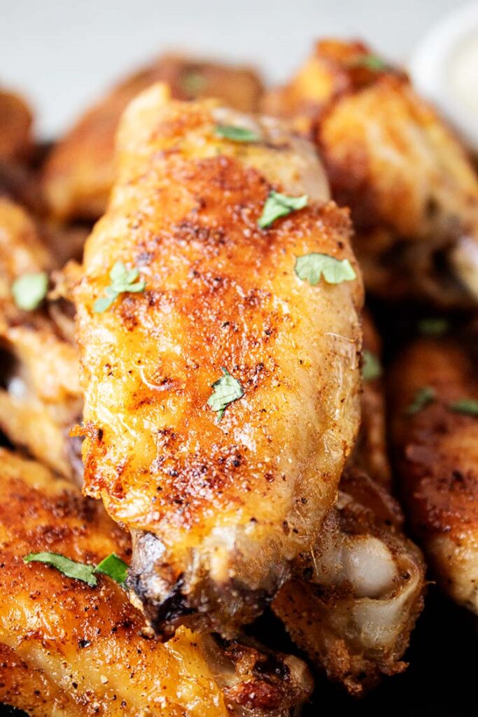 closeup view of air fryer chicken wings ready to serve
