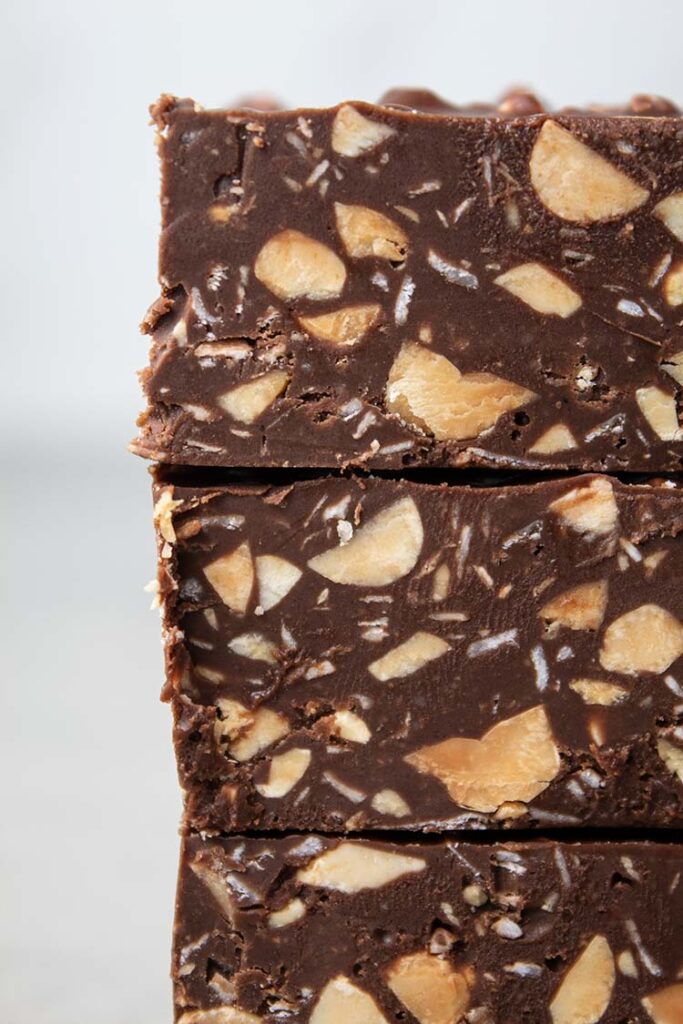 sideview of stack of 3 peanut butter crunch bars that are homemade and gluten free