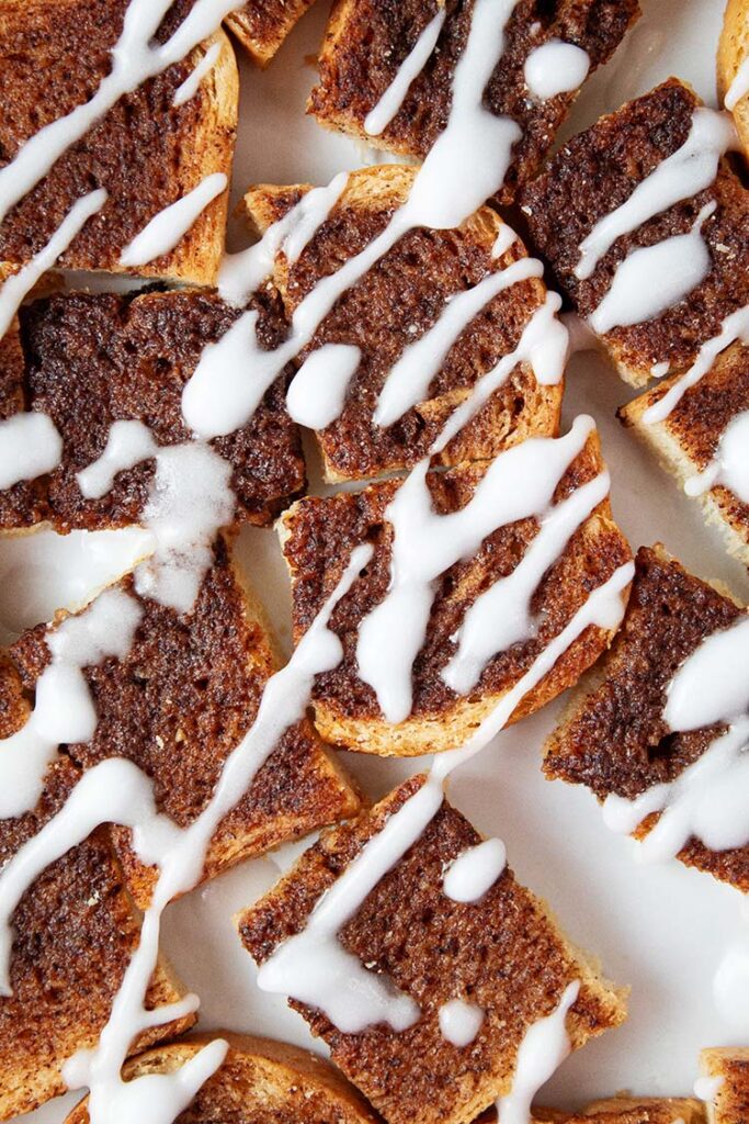 overhead view of air fryer cinnamon toast with frosting on top