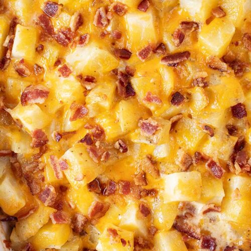 overhead view of cheesy potato casserole ready to serve