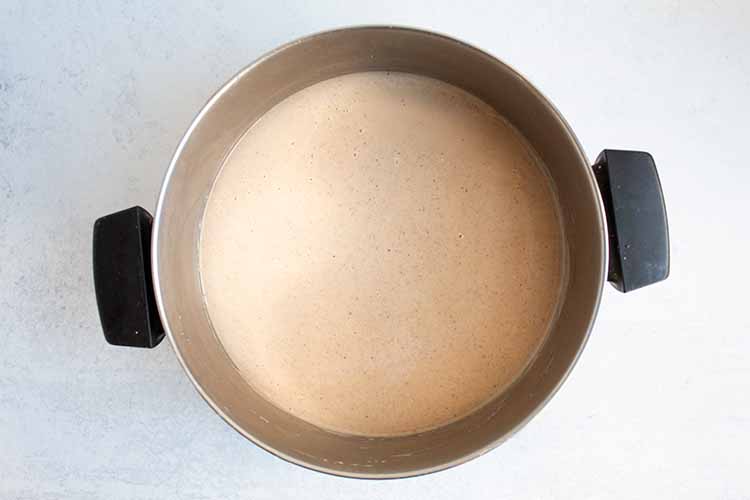 overhead view of pot with fully combined milk and egg mixture