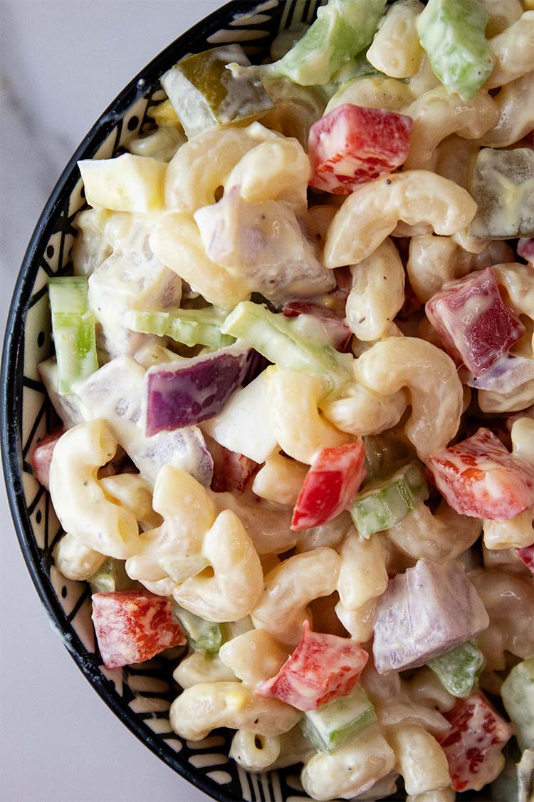 overhead view of a bowl of macaroni salad ready to serve