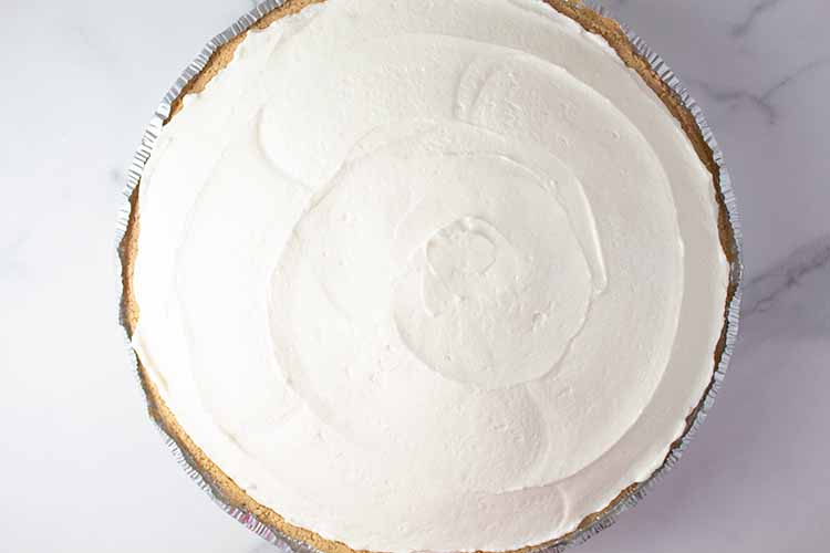 overhead view of no bake cheesecake in pie crust