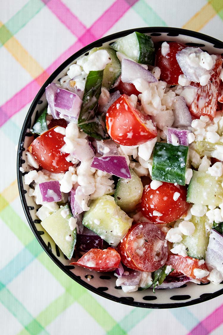 overhead view of cottage cheese salad ready to serve in a small bowl