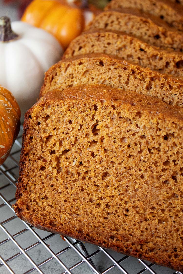 sideview of slices of high protein pumpkin bread ready to serve